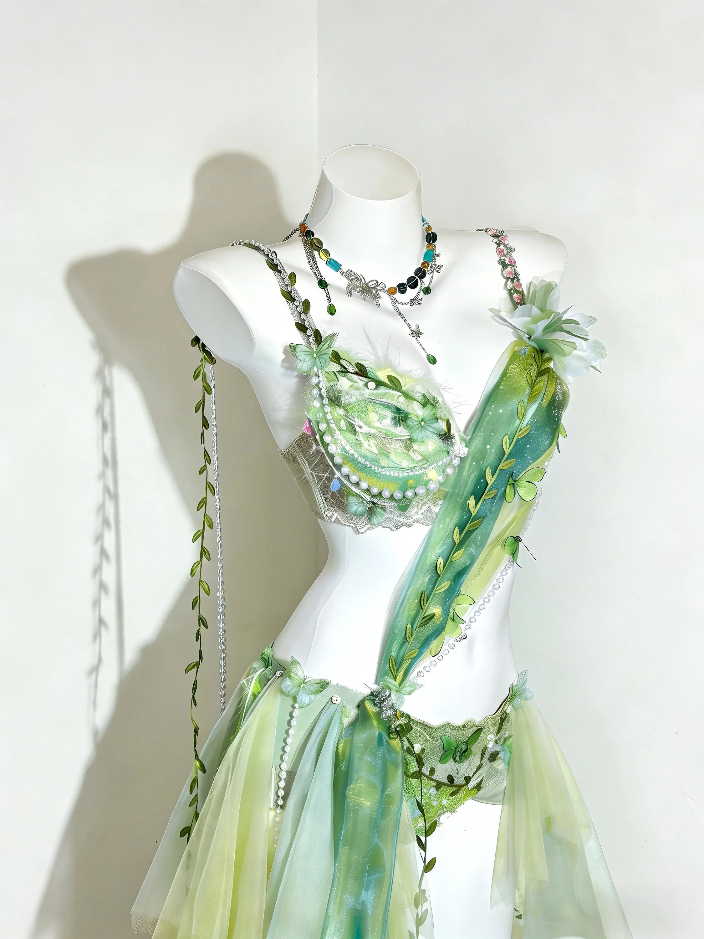 AVRY Ivy Bloom Set side view showing sheer green drapes, layered textures and ethereal festival outfit details.