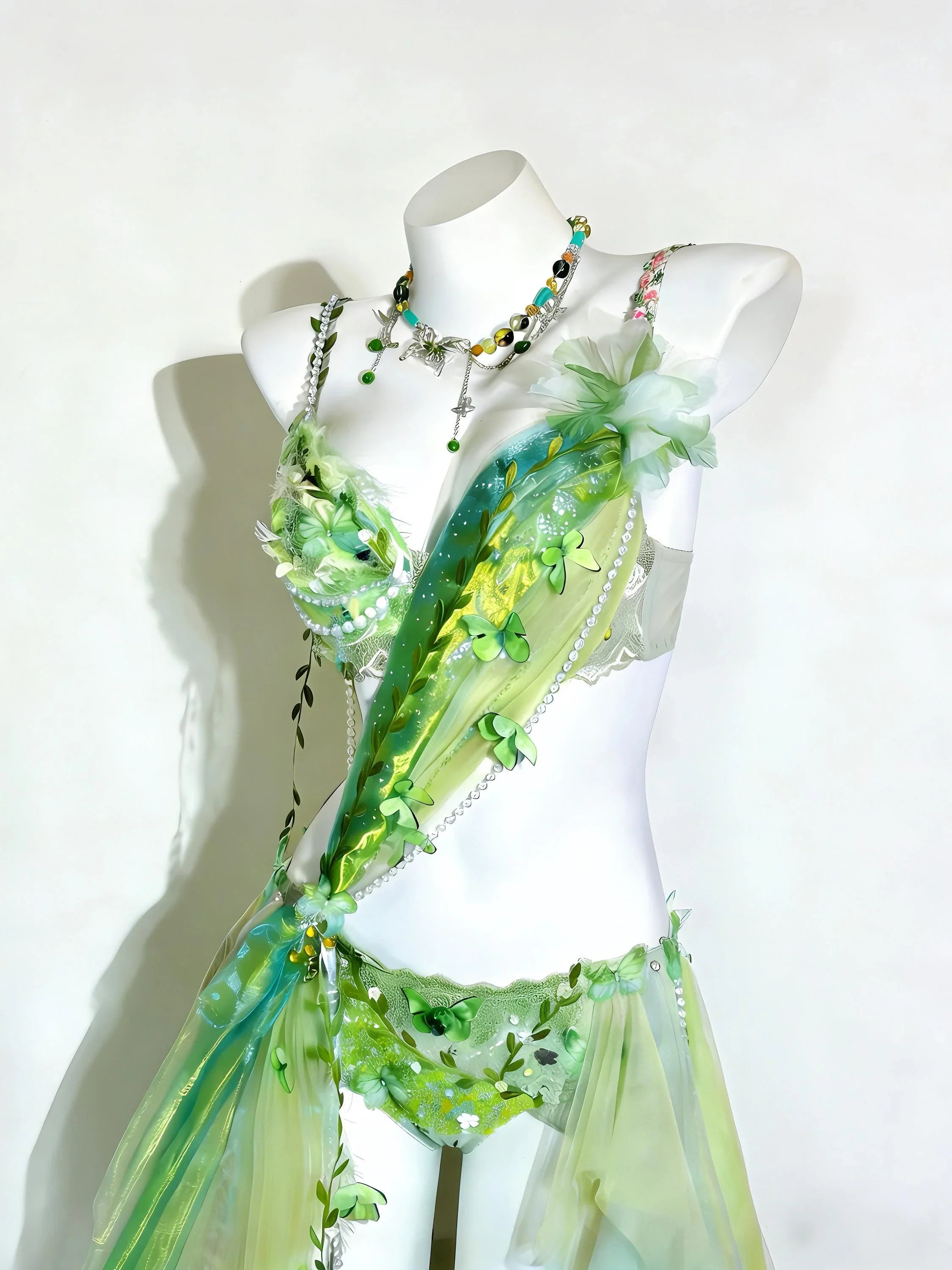 AVRY Ivy Bloom Set close-up detail with botanical embellishments, crystal details and soft green fairy styling.