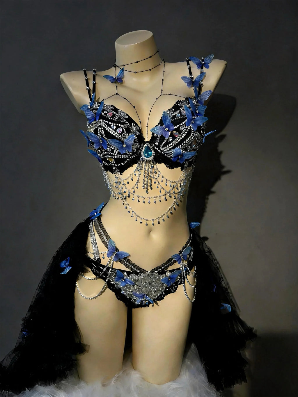 AVRY Azure Morpho blue butterfly rave outfit with embellished top, matching bottom and tulle wrap skirt.