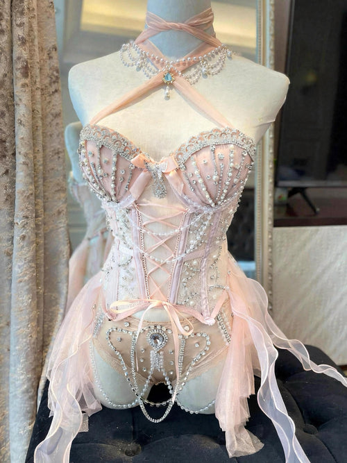 AVRY Akoya Pearl Rave Set featuring a crystal corset top, pearl embellished bottoms and ocean-inspired details