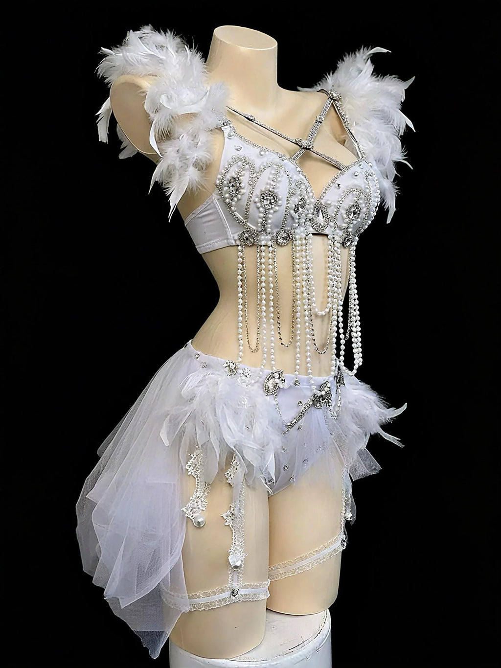 AVRY Dovea Set Aether Plume collection front view with pearl chain details, crystal accents and feather styling.