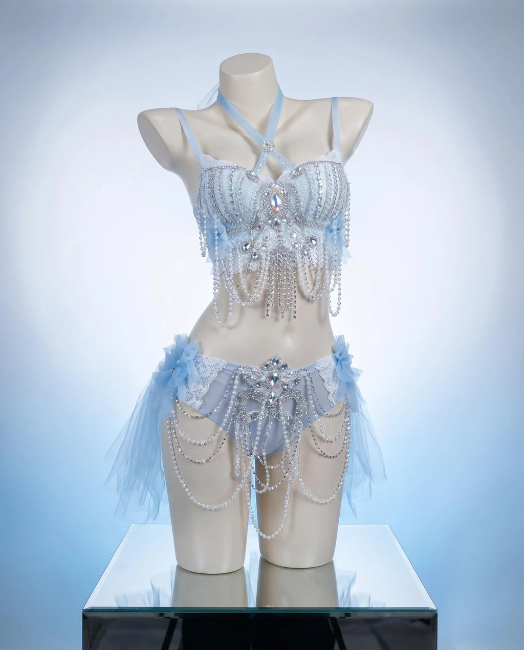 AVRY Dovea Set side view showing white feather top, layered textures and ethereal festival outfit details.