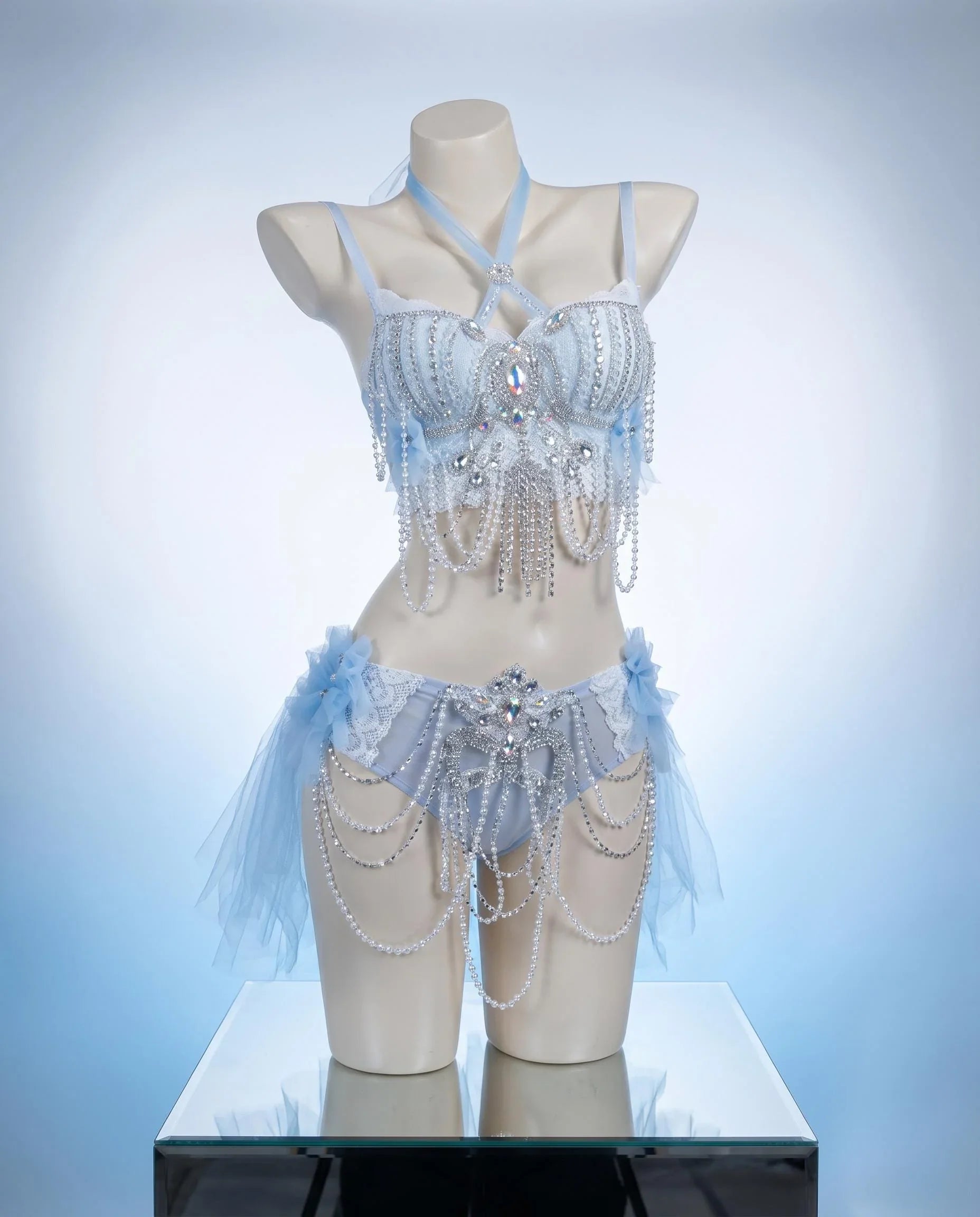 AVRY Dovea Set side view showing white feather top, layered textures and ethereal festival outfit details.