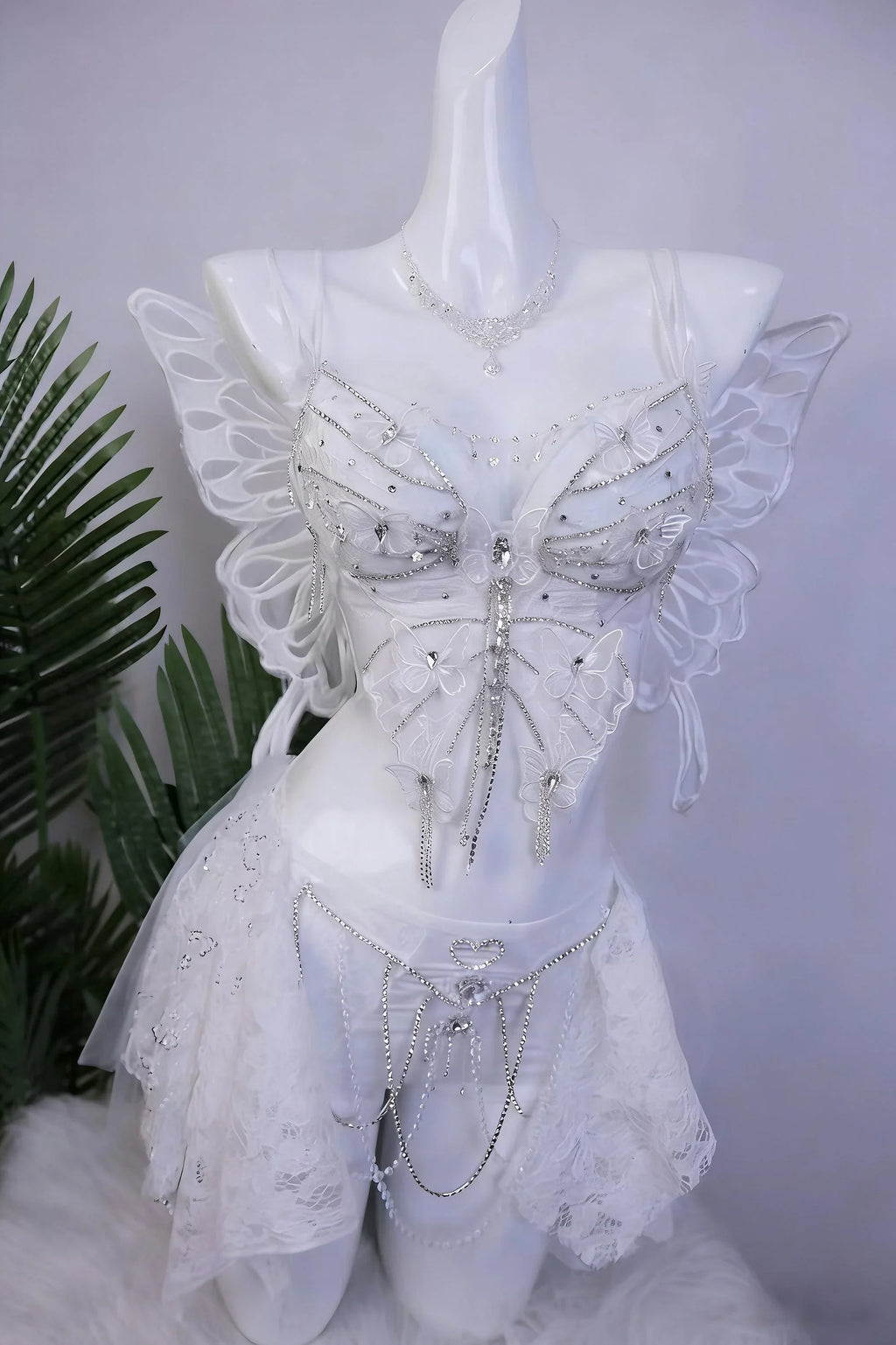 AVRY Lilac Morpho white fairy rave outfit with top, bottom, necklace and optional wings for ethereal festival styling.