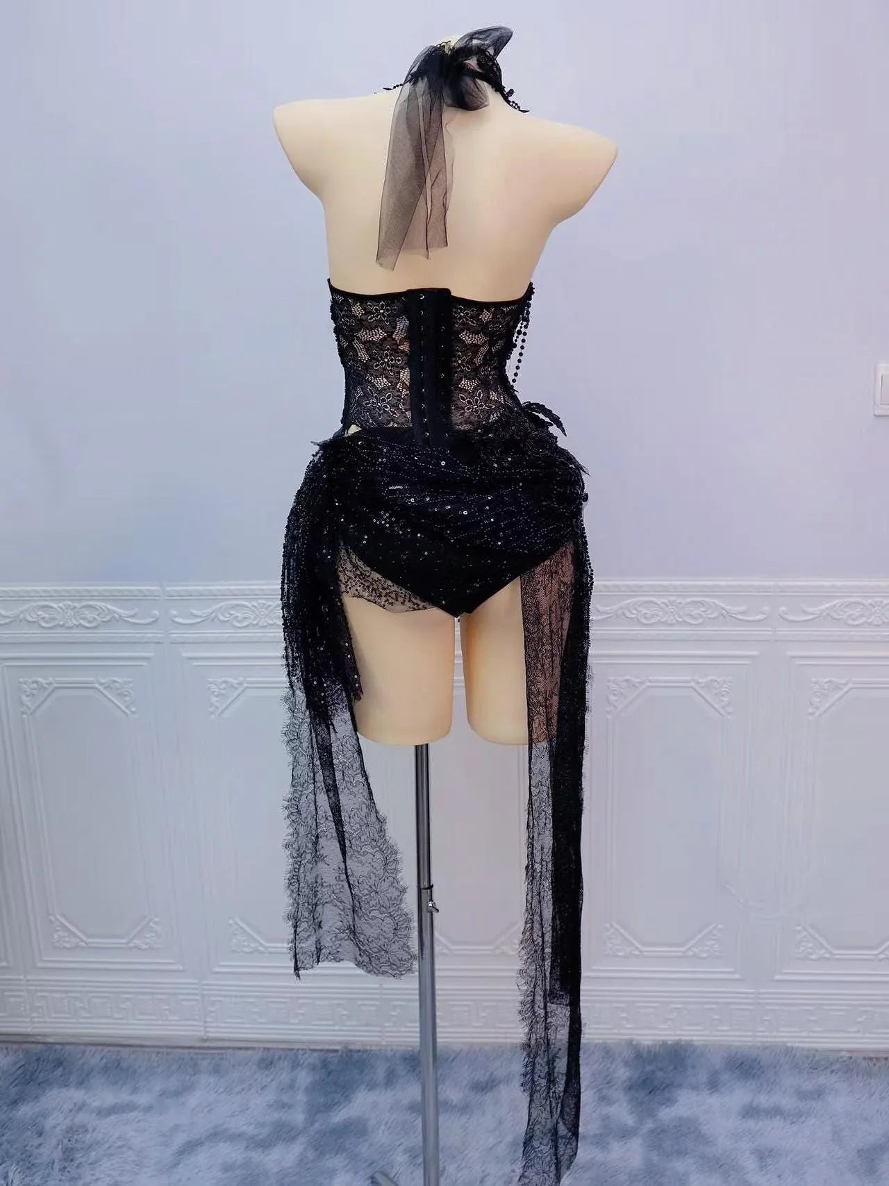 AVRY Odette Set back view with gothic lace details, black skirt and dramatic festival silhouette.