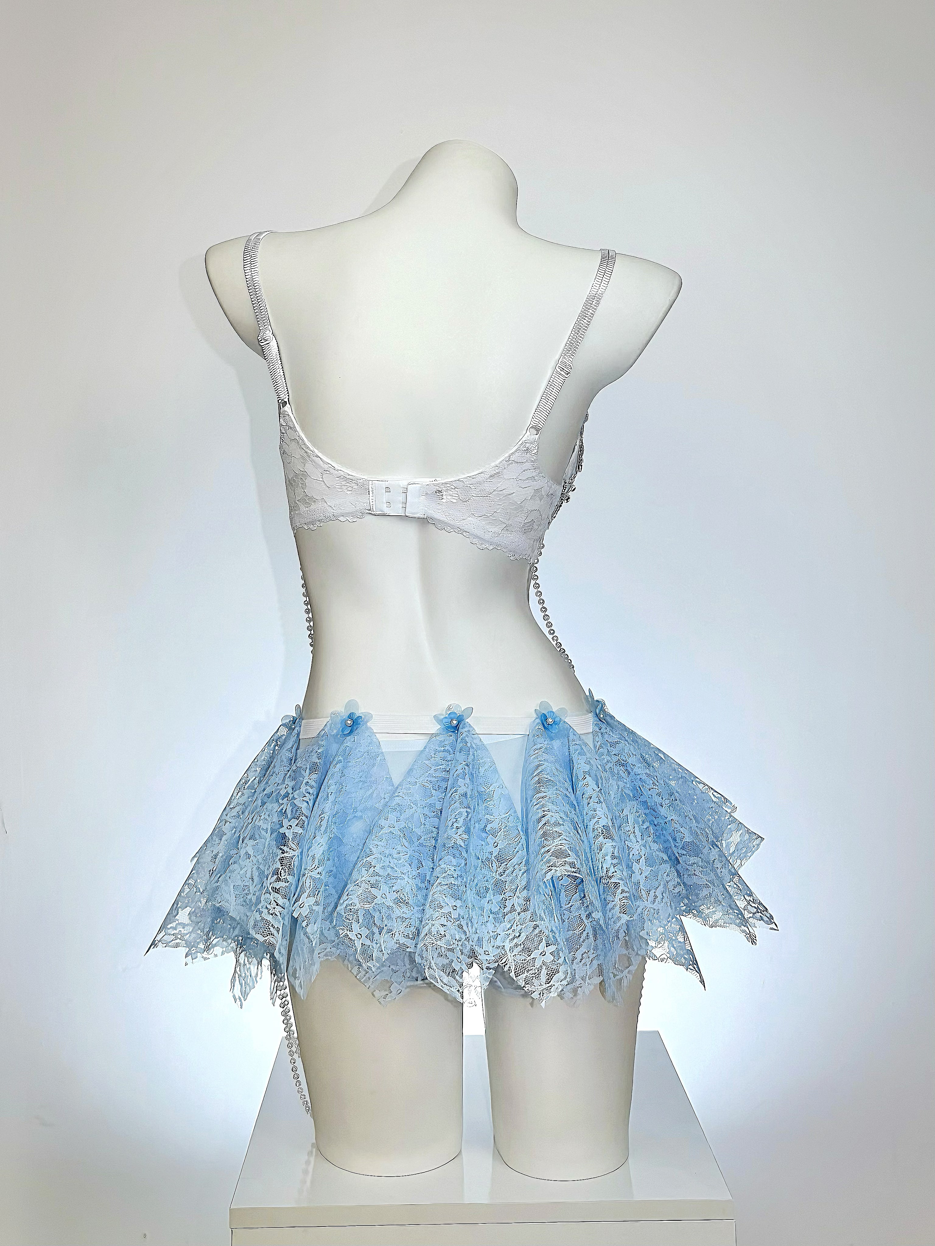 AVRY Seraphina Fiora floral fairy festival outfit in Blue Blossom featuring blue floral appliqués, pearls and crystal embellishments.