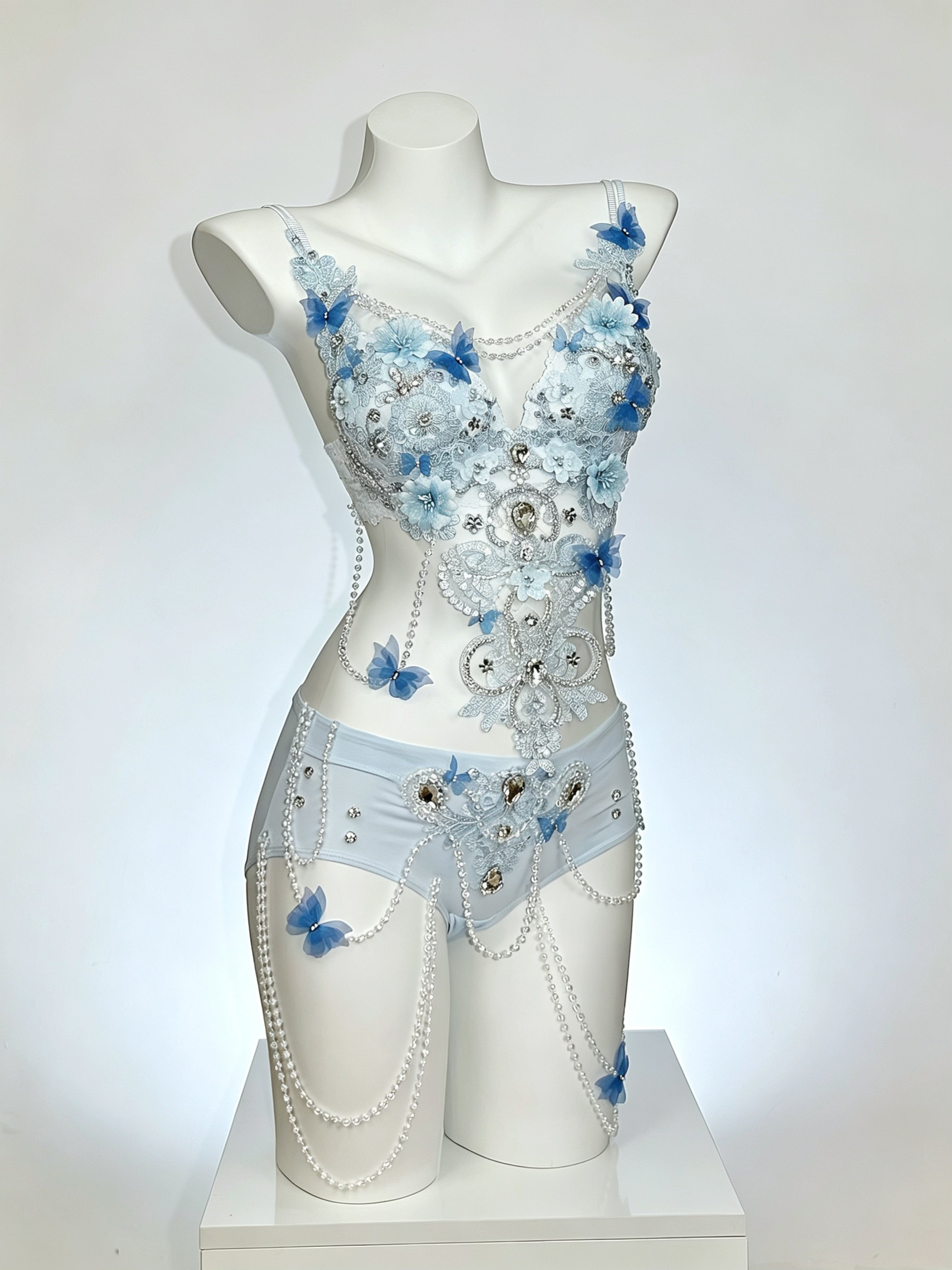 AVRY Seraphina Fiora floral fairy festival outfit in Blue Blossom featuring blue floral appliqués, pearls and crystal embellishments.