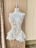 AVRY Seraphina Fiora floral fairy festival outfit in Ivory Bloom featuring handcrafted flowers, pearls and crystal embellishments.